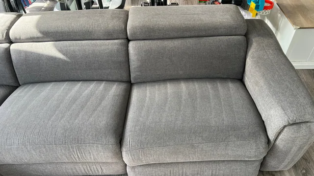 Grey fabric sofa after cleaning